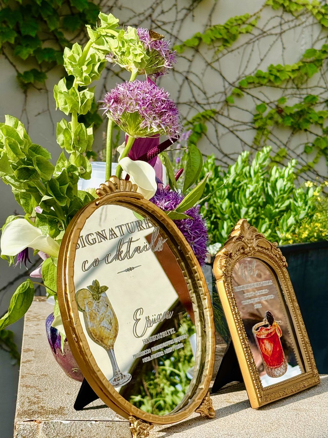 Signature cocktail signs in vintage gold frames